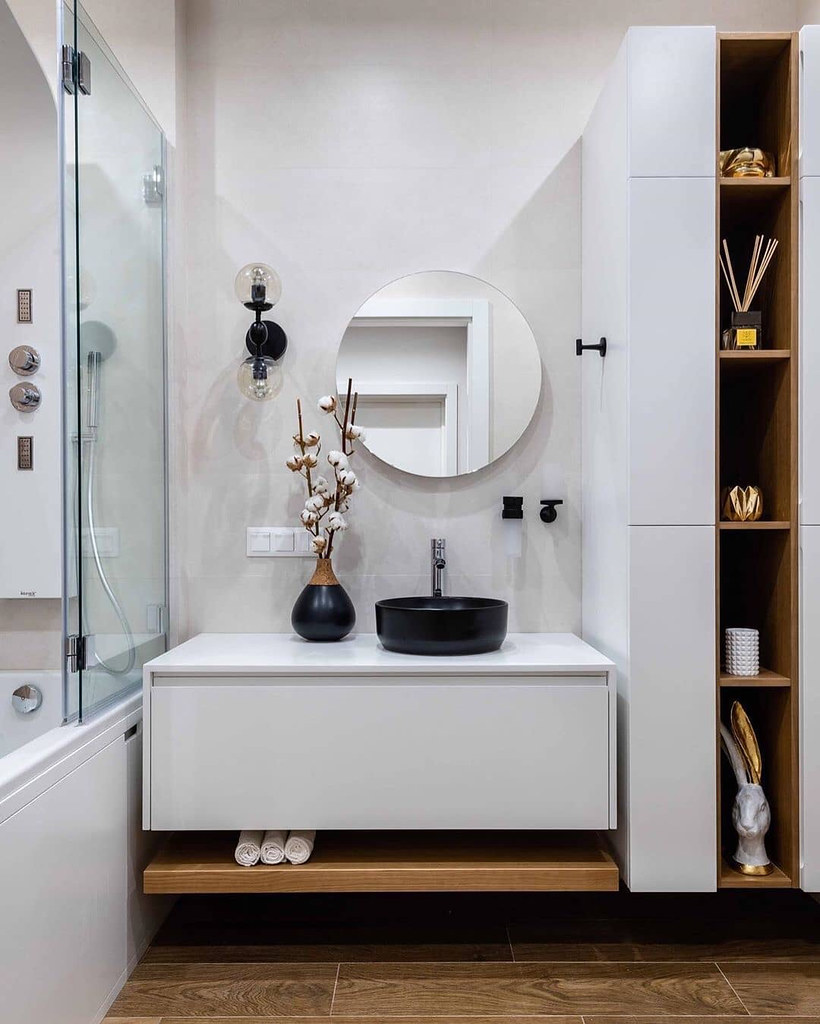 Single vanity with clear counter width, mirror alignment, and compact bathroom proportions