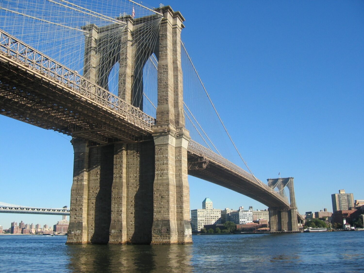 Brooklyn Bridge stone towers and cable web in New York City