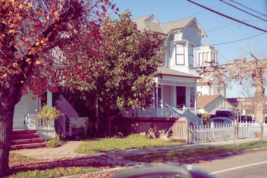 Victorian house with a white picket fence.
