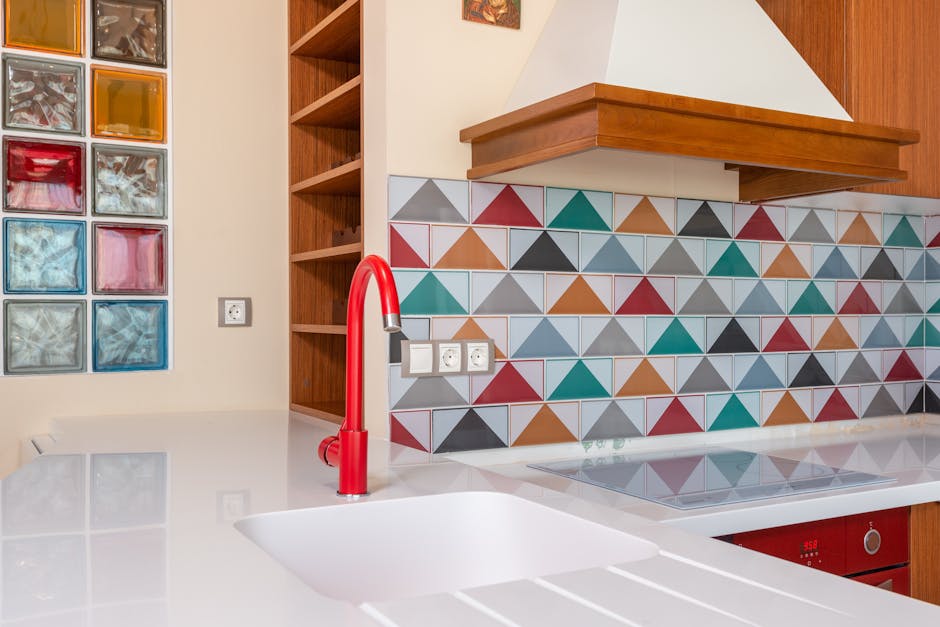 Colorful tile backsplash behind a kitchen counter