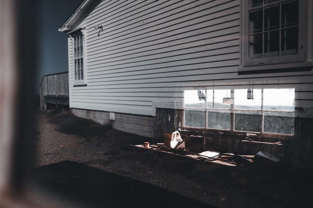 a house with a window in the middle of it