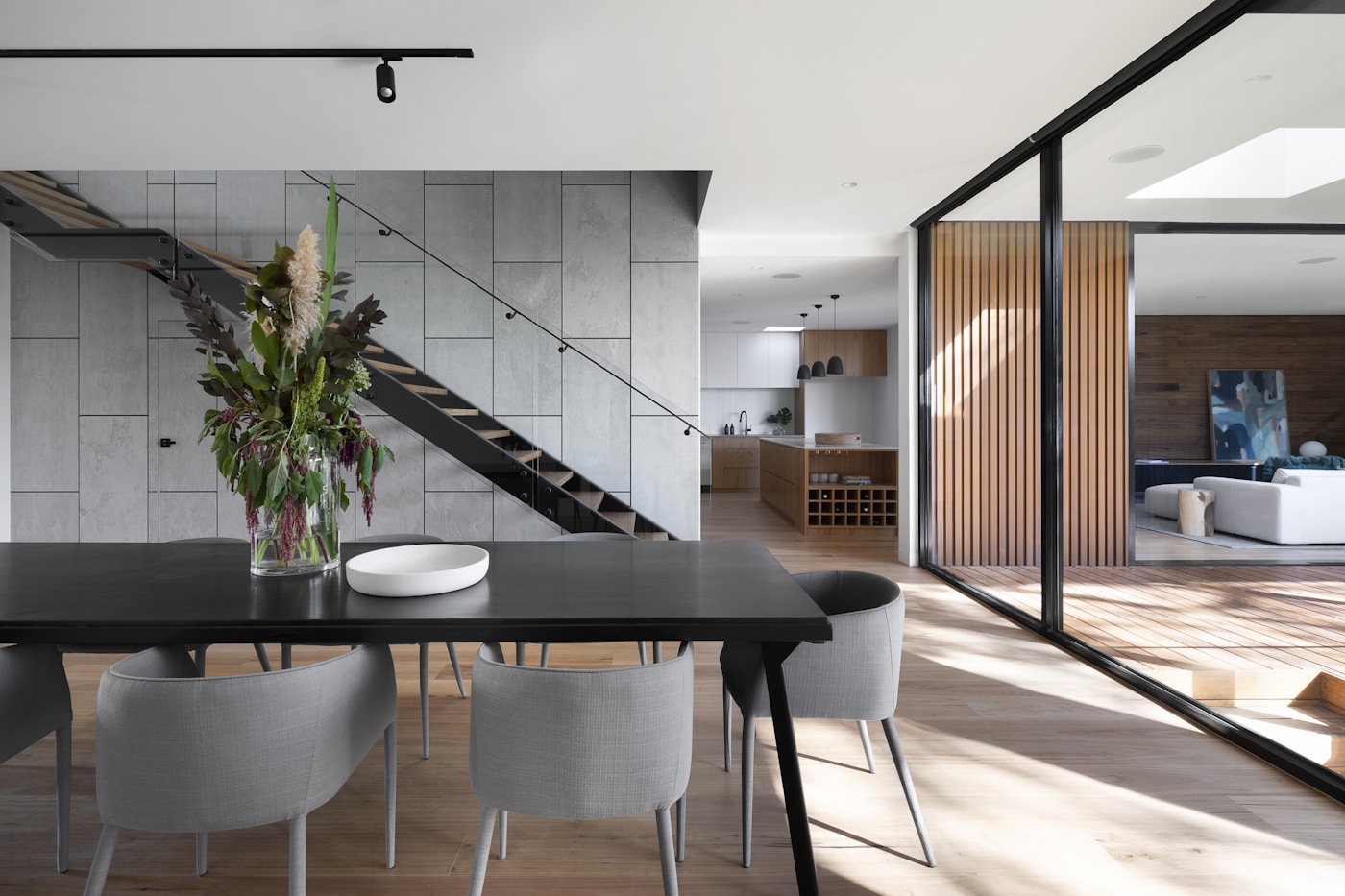 The Textile Building’s exposed brick and steel truss interiors in Los Angeles, repurposed for creative workspaces.