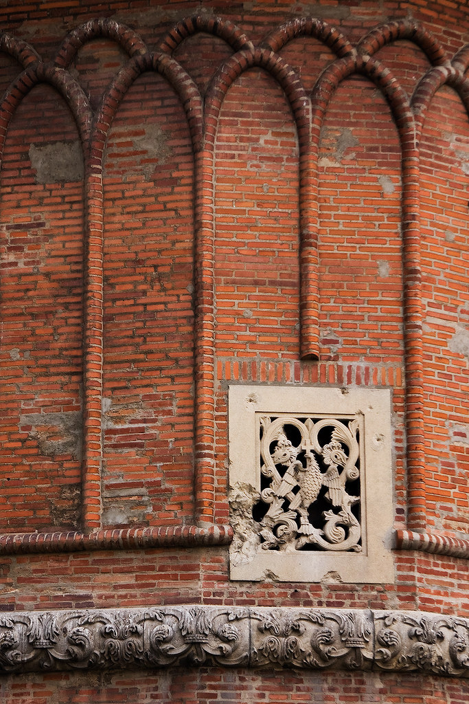 Brick exterior walls paired with insulation to balance thermal mass and energy efficiency.