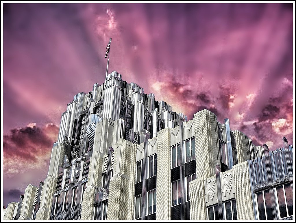 Niagara Mohawk Building demonstrates soft pastel greens with cream undertones under natural light.