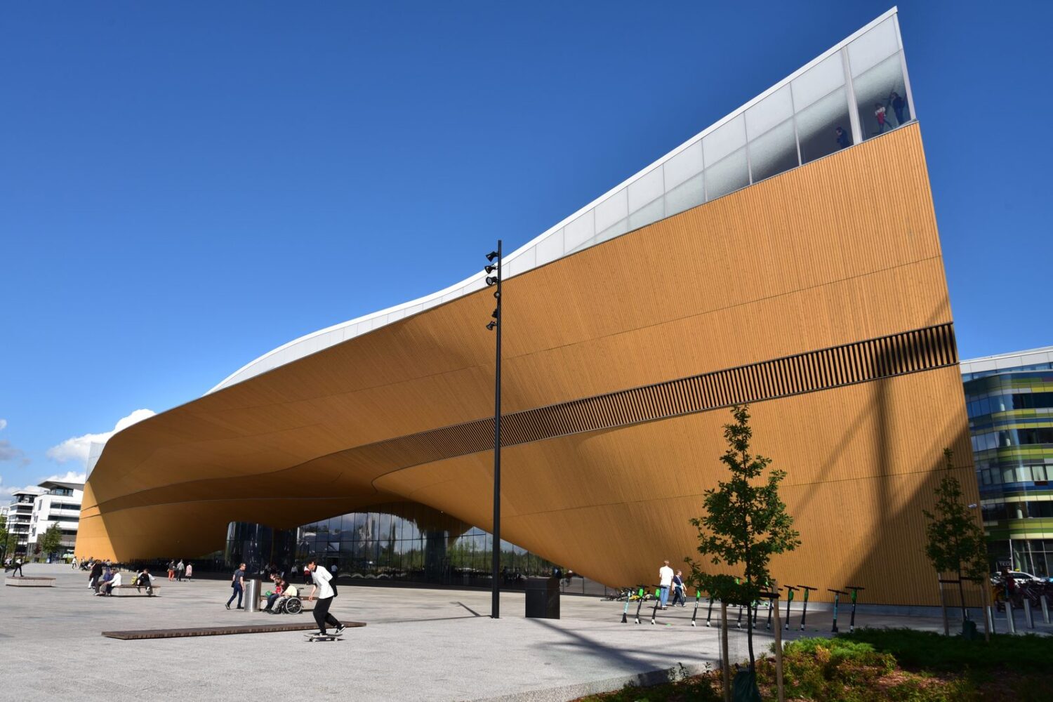 Helsinki Central Library Oodi, Helsinki, Finland, exemplifying sustainable design with sculpted wooden facade.