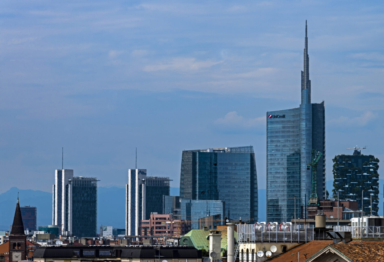 A vertical forest residential complex with lush greenery integrated into Milan’s urban landscape.