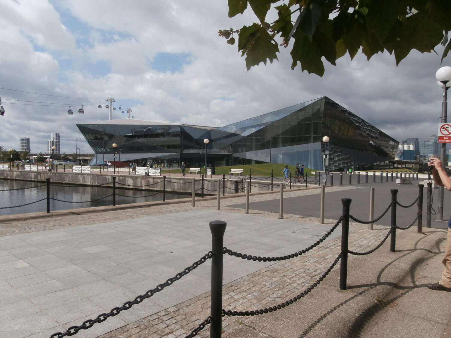Geometrically glazed exhibition and office building implementing advanced sustainable technologies in London.