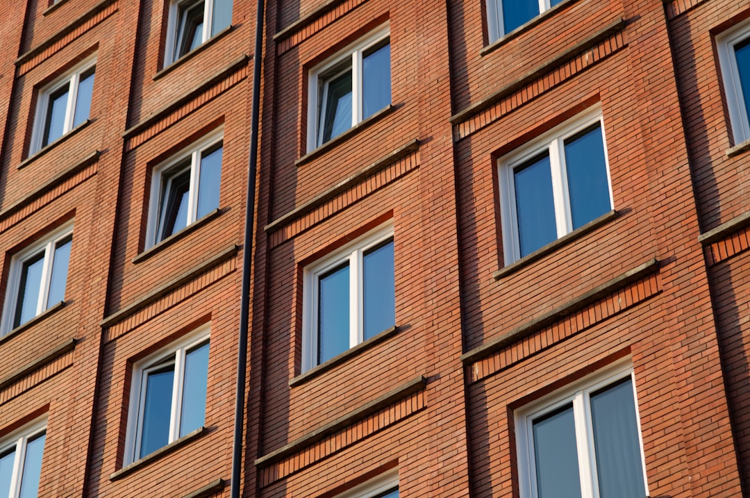 Red brick building exterior with many windows