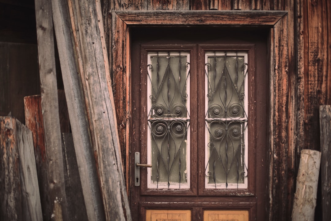brown wooden framed glass window
