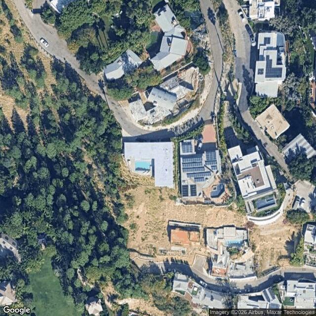 Aerial perspective of the surrounding area of the Stahl House, highlighting its hilltop position.