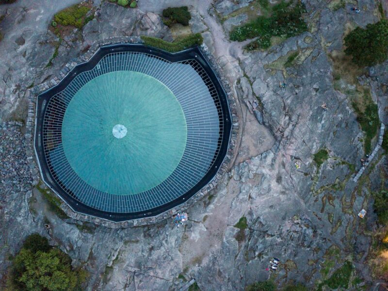 Bird's eye view of the Temppeliaukion Church in Helsinki on a summer evening.