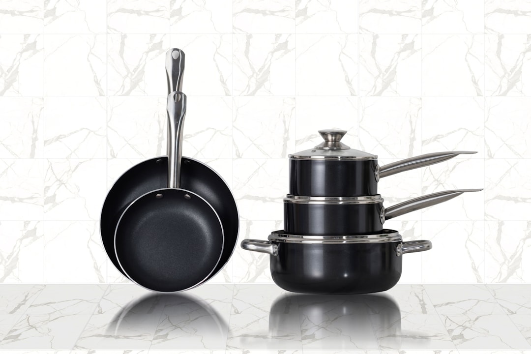 Induction cookware set on a stove.