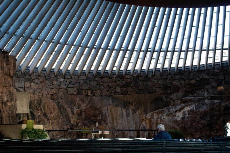 Inside view of Temppeliaukio Church in Helsinki showcasing stunning architecture.