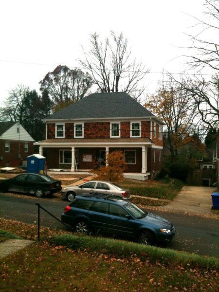 Posts wrapped, gutters installed.
